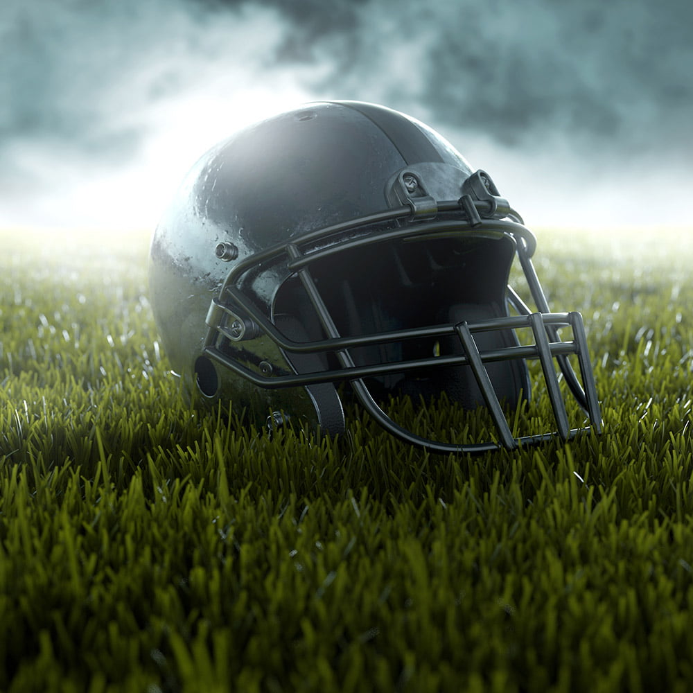 A helmet kept on grass with cinematic filter