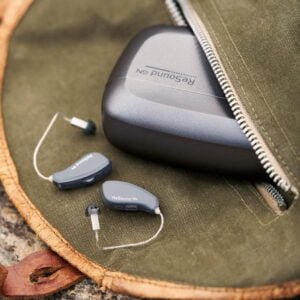 Resound hearing aid chargers in pocket resized